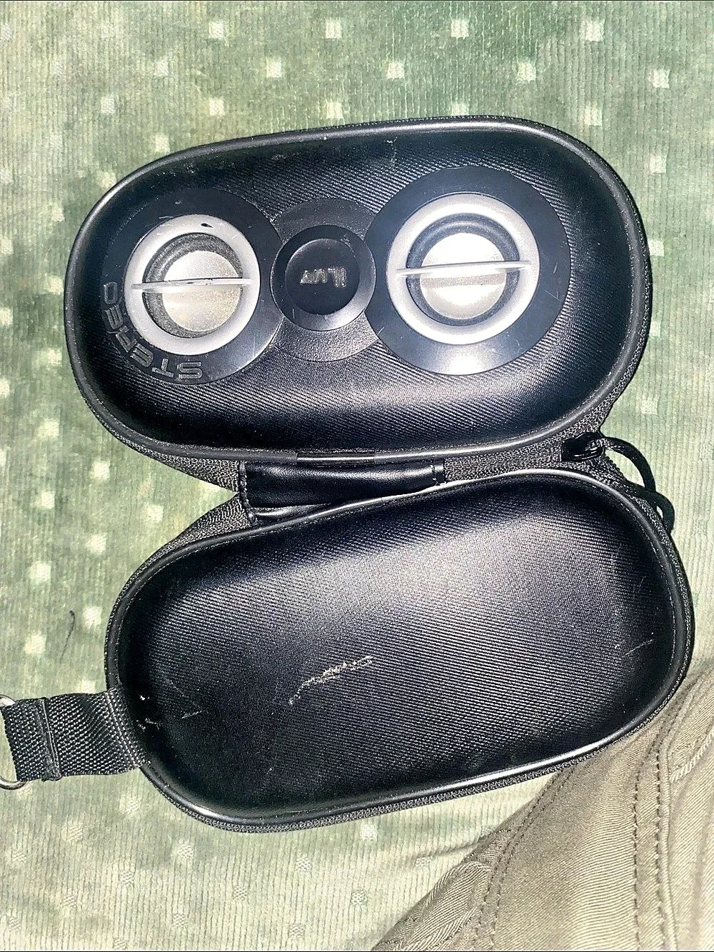 Portable speaker in carrying case in black